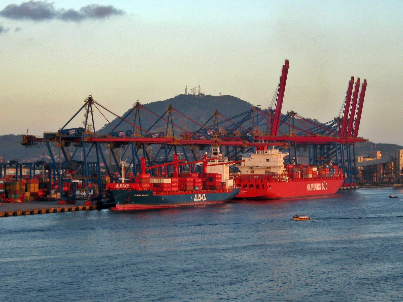Container ships under the cranes at the Port of Santos, the busiest port in Latin America