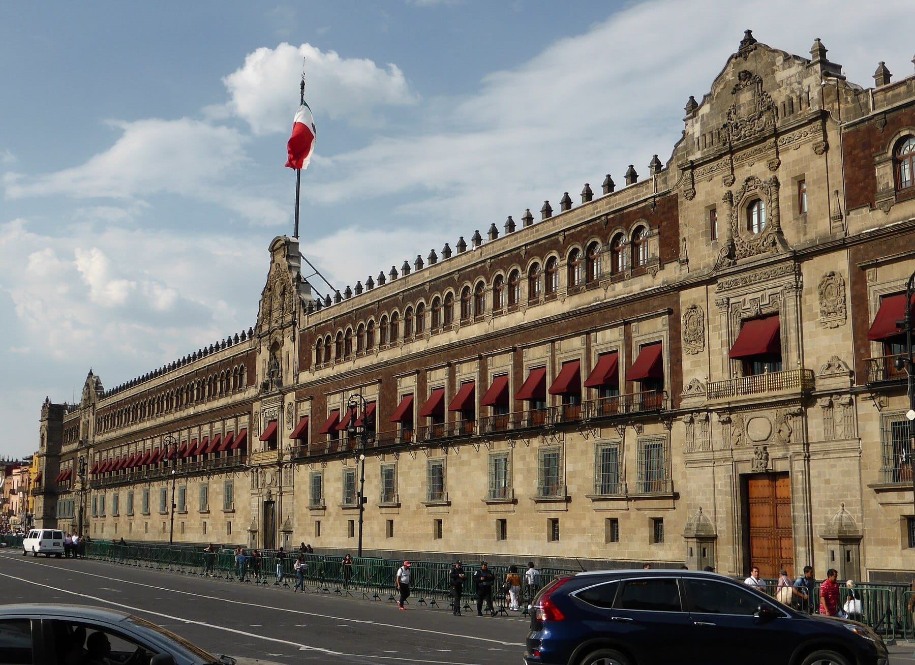 Mexico’s National Palace and the Mexican flag beside the Zócalo