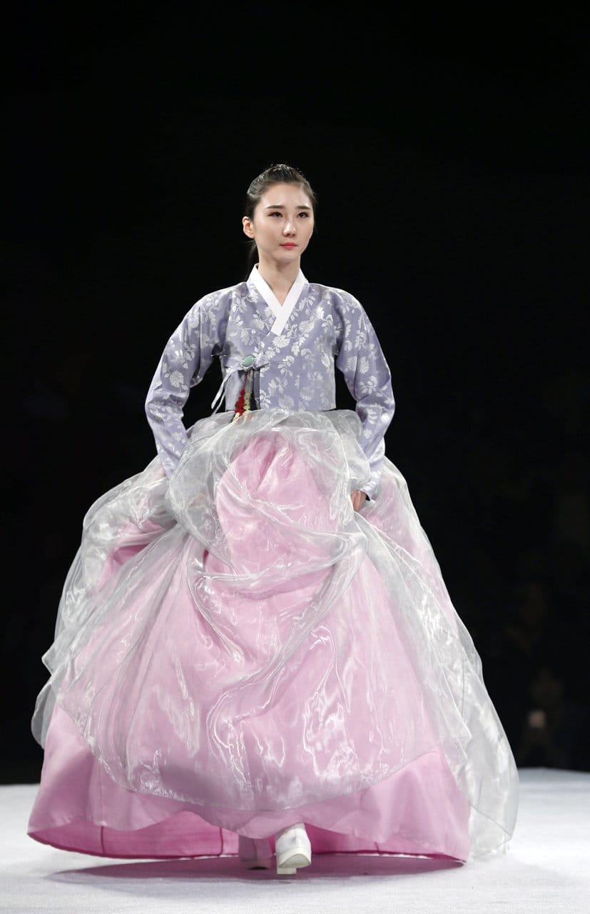 A model wearing a traditional Korean hanbok