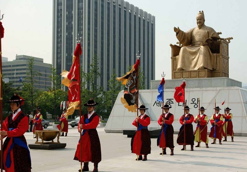 Ceremonial guards beside the statue of King Sejong in Seoul