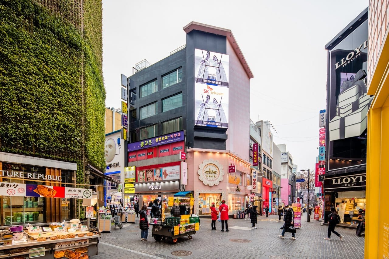 Shops and pedestrians along a street in Myeong-dong, Seoul