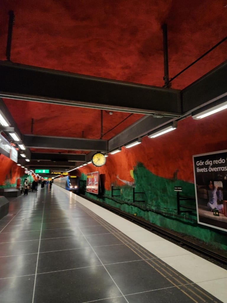 A train arriving at Solna Centrum metro station in Stockholm