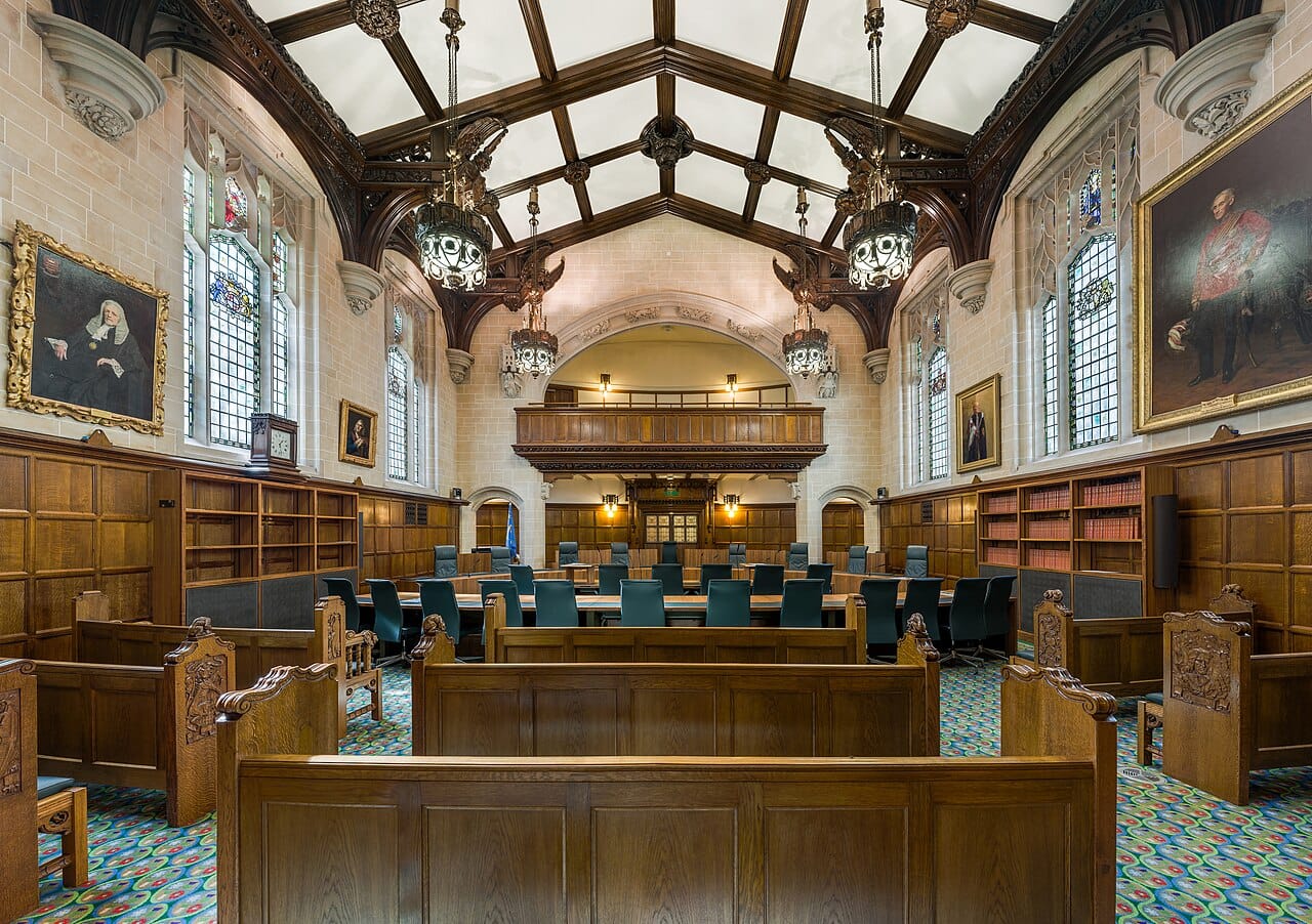 A supreme court chamber, the bench facing rows of counsel