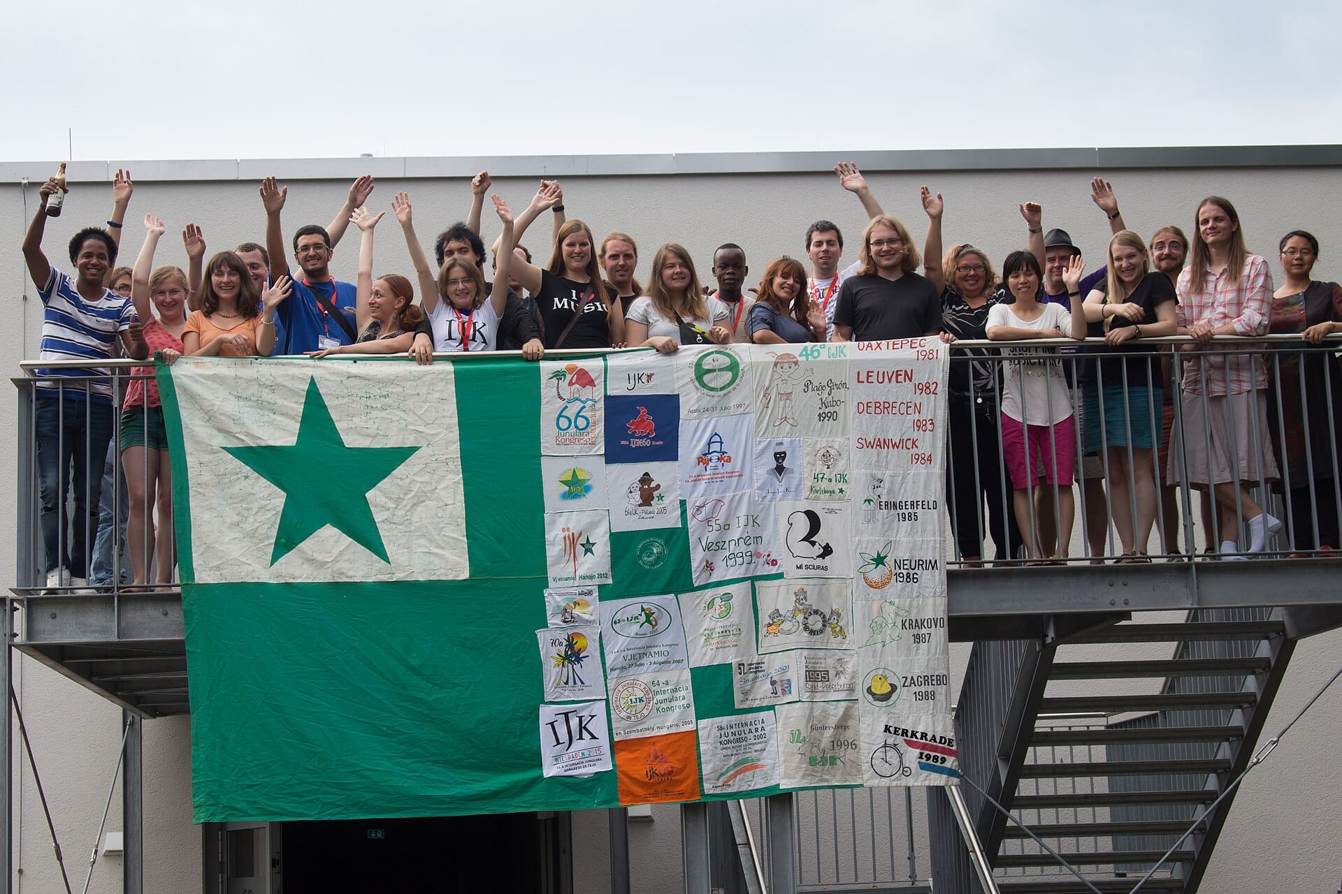 The green star flag of Esperanto carried at a gathering of speakers