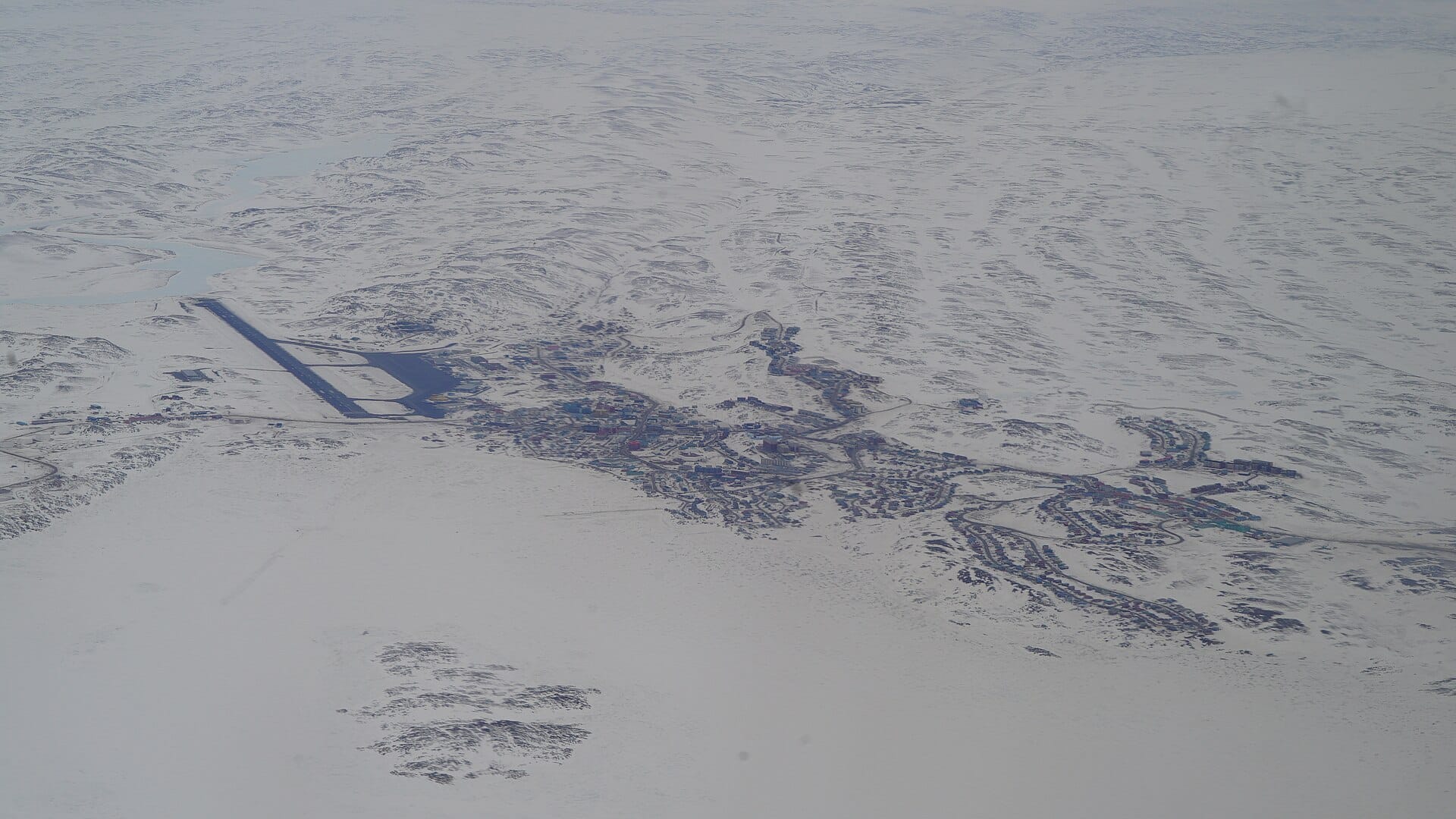 Iqaluit spread along Frobisher Bay, seen from the air