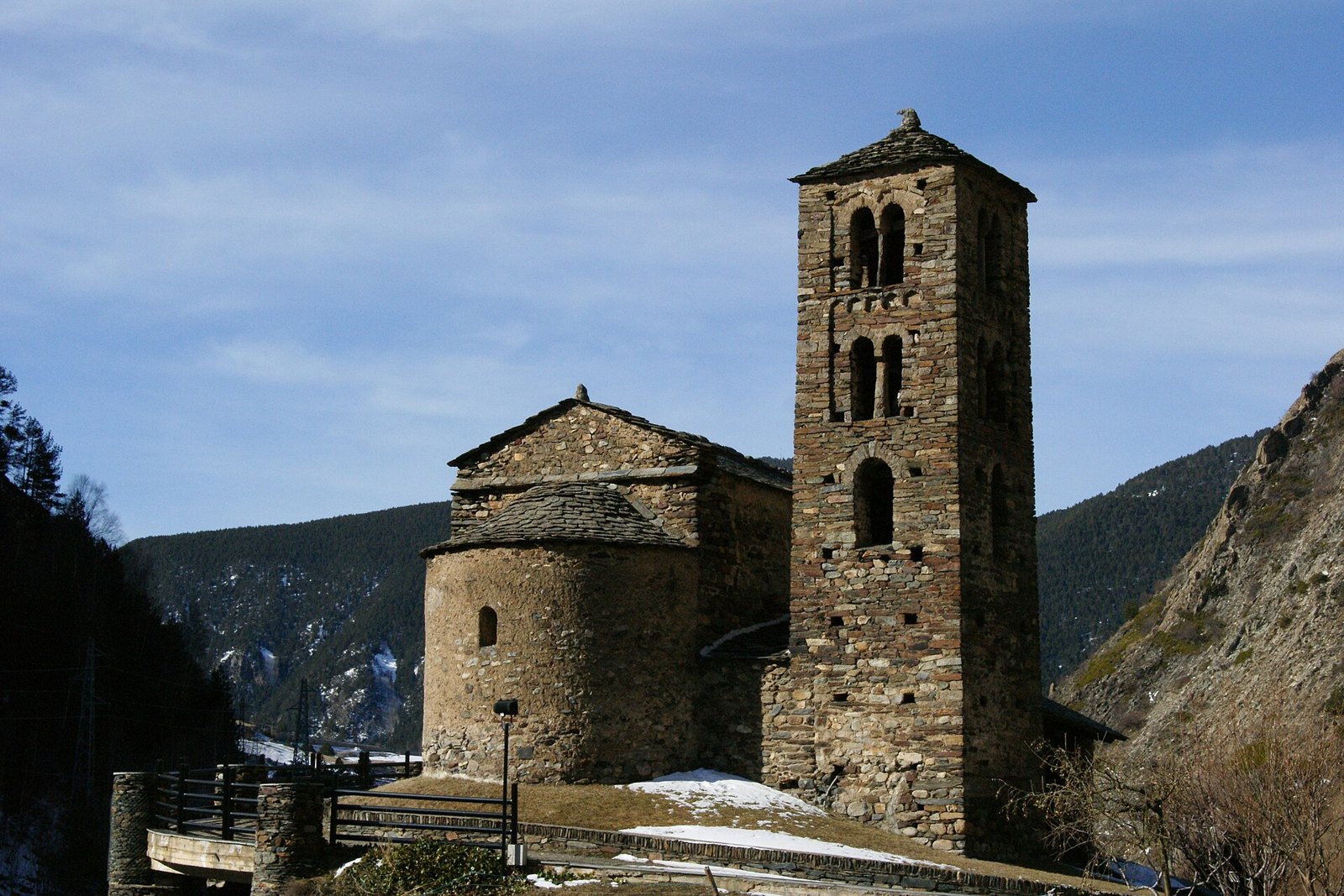 The Romanesque church and bell tower of Sant Joan de Caselles below the mountains at Canillo