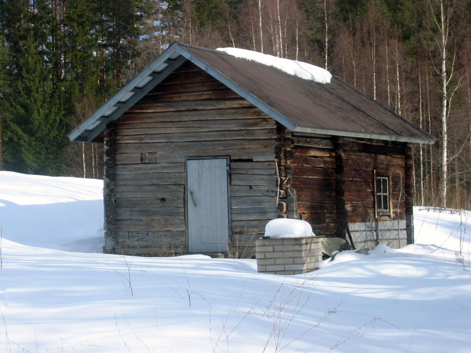A traditional wooden smoke sauna in Enonkoski, Finland