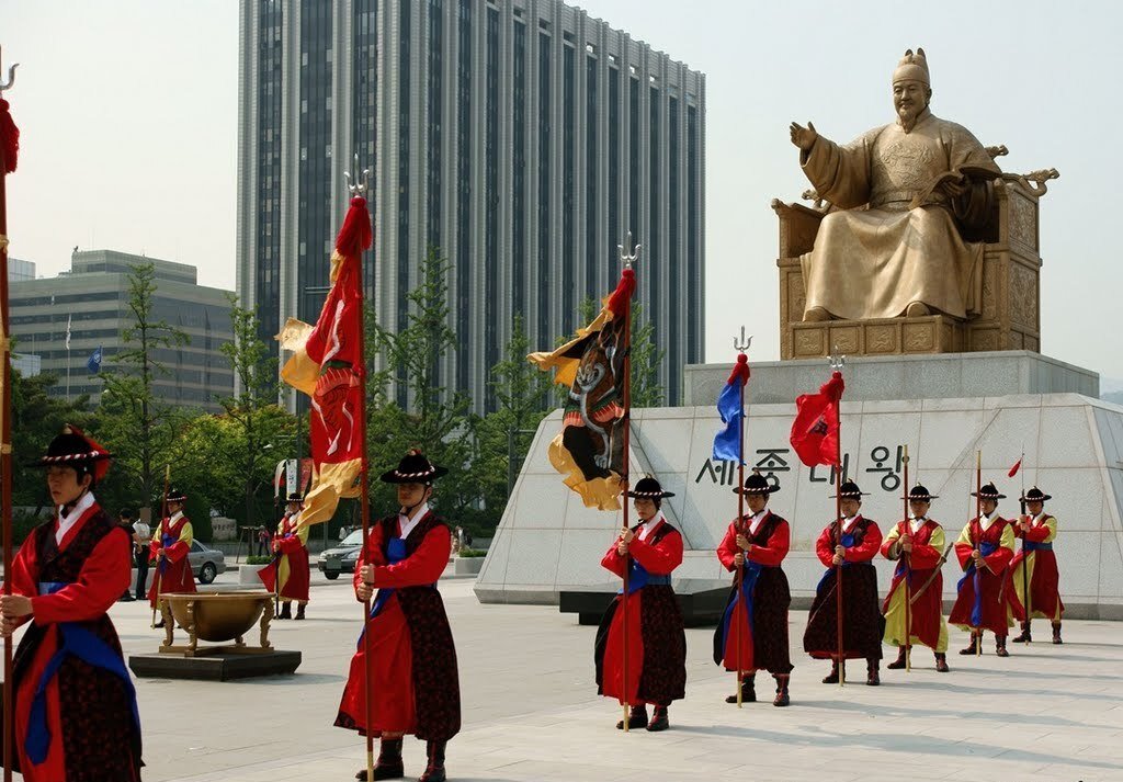 Ceremonial guards beside the statue of King Sejong in Seoul
