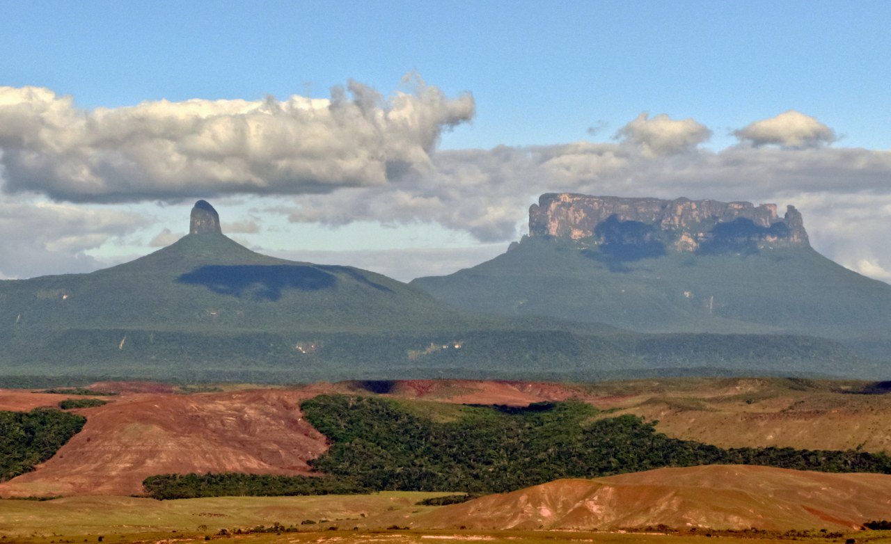 Wadakapiapuรฉ and Yuruanรญ tepuis rising above the Gran Sabana in Canaima National Park