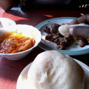 A meal with stiff porridge and accompaniments in Burundi