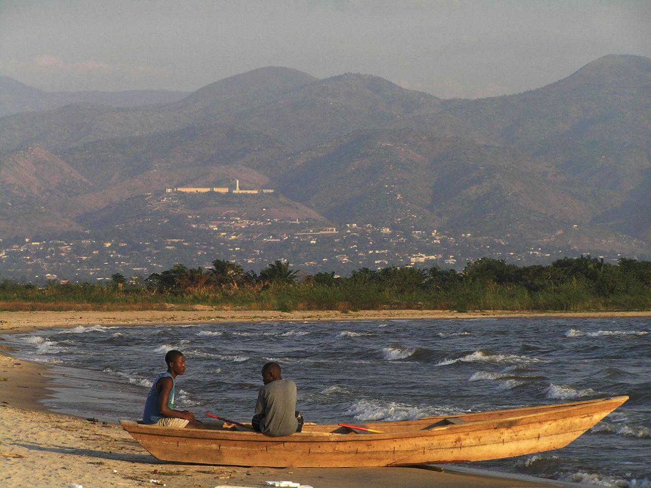 Fishers with a boat beside Lake Tanganyika, Burundi