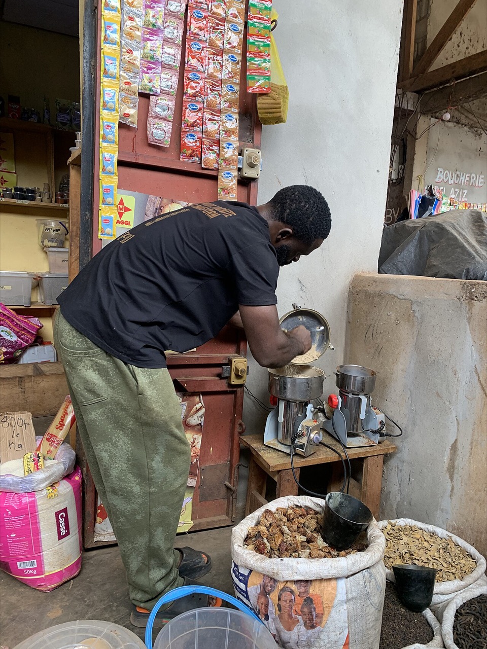 A spice vendor at a market in Yaoundé, Cameroon