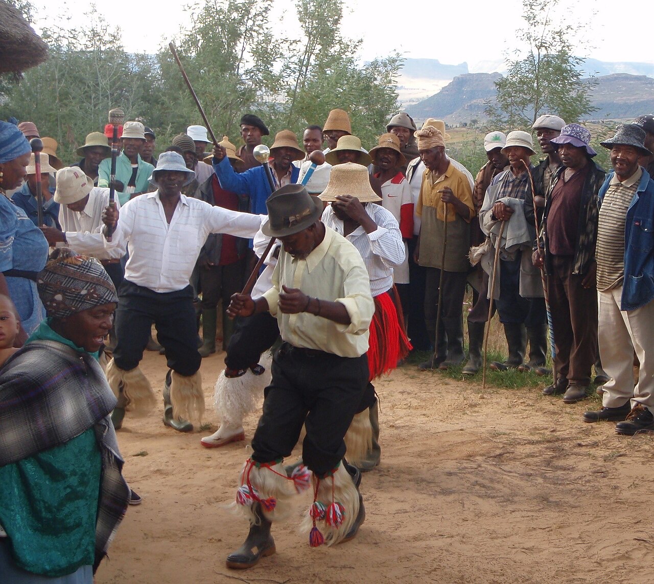 Basotho men performing a stick dance, Lesotho