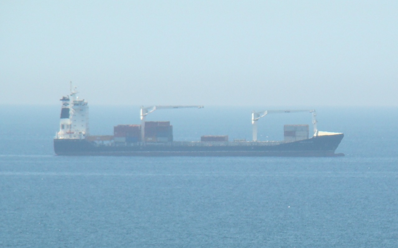 A container ship at the port of Tripoli, Libya