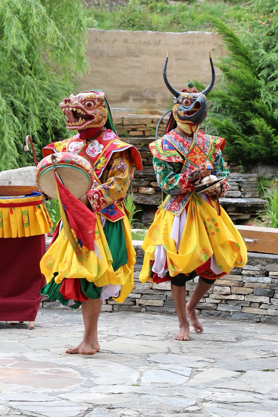 Masked dancers at a festival in Paro, Bhutan