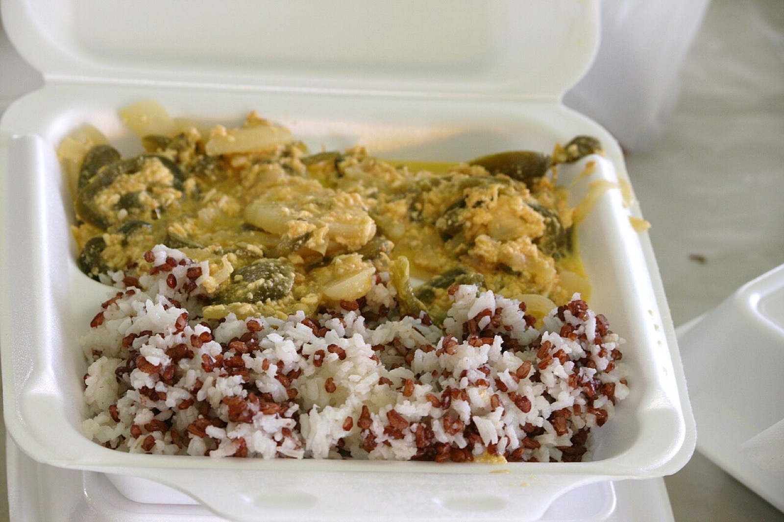 Ema datshi with red and white rice, a Bhutanese meal