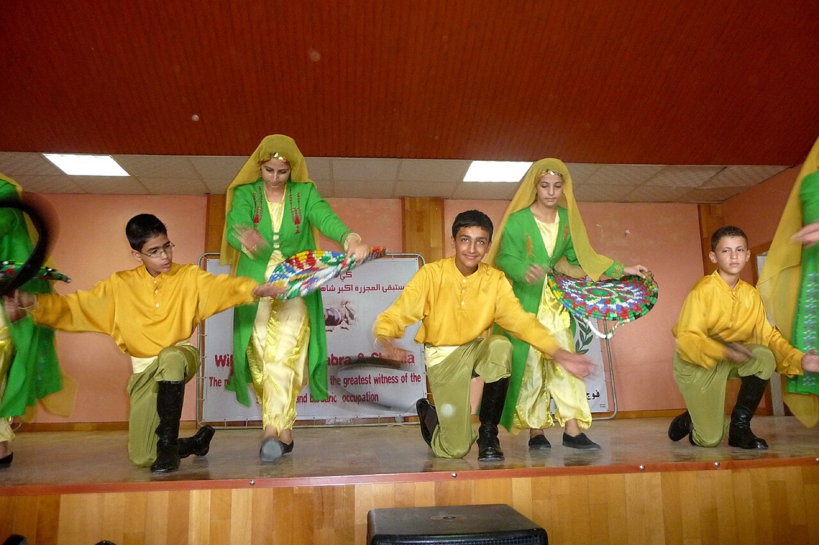 Children performing a Palestinian dance in Burj el-Shemali camp, Lebanon