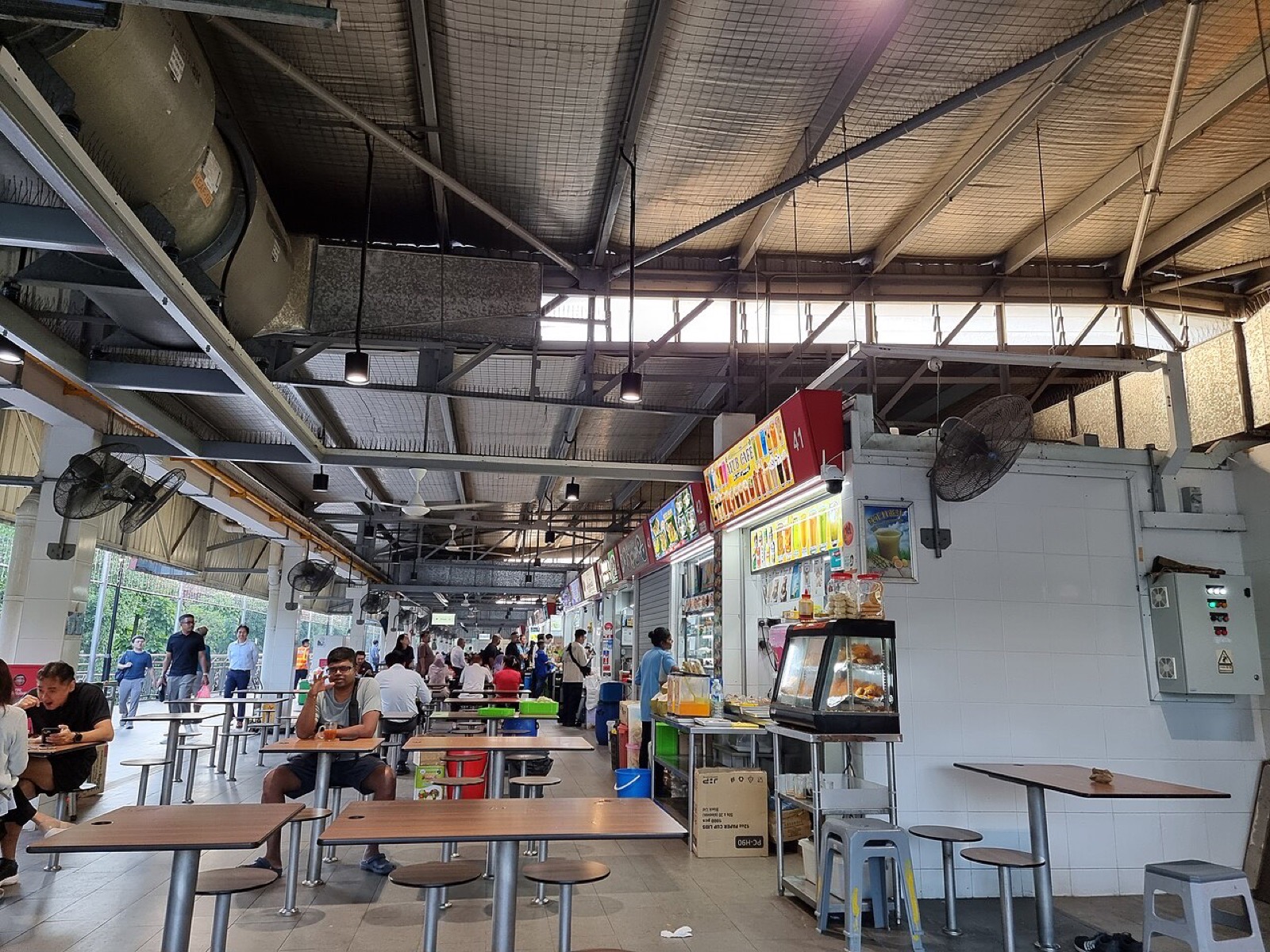 Diners inside Seah Im Food Centre in Singapore