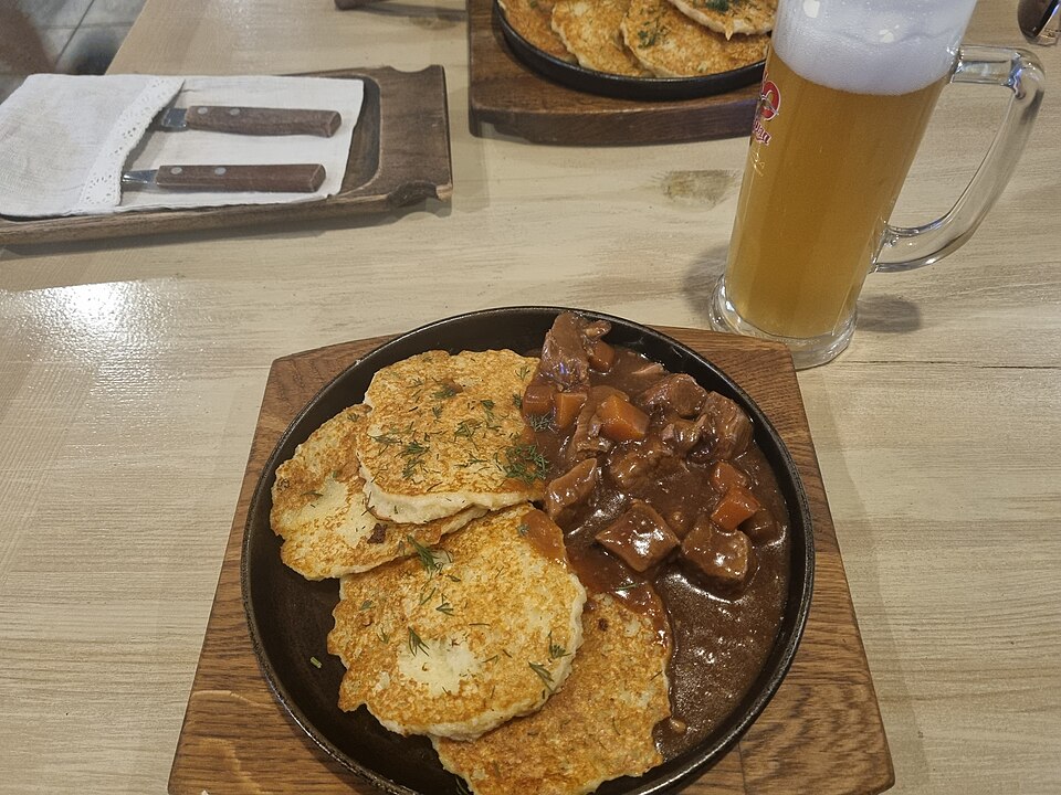 Draniki potato pancakes with goulash at a café in Minsk