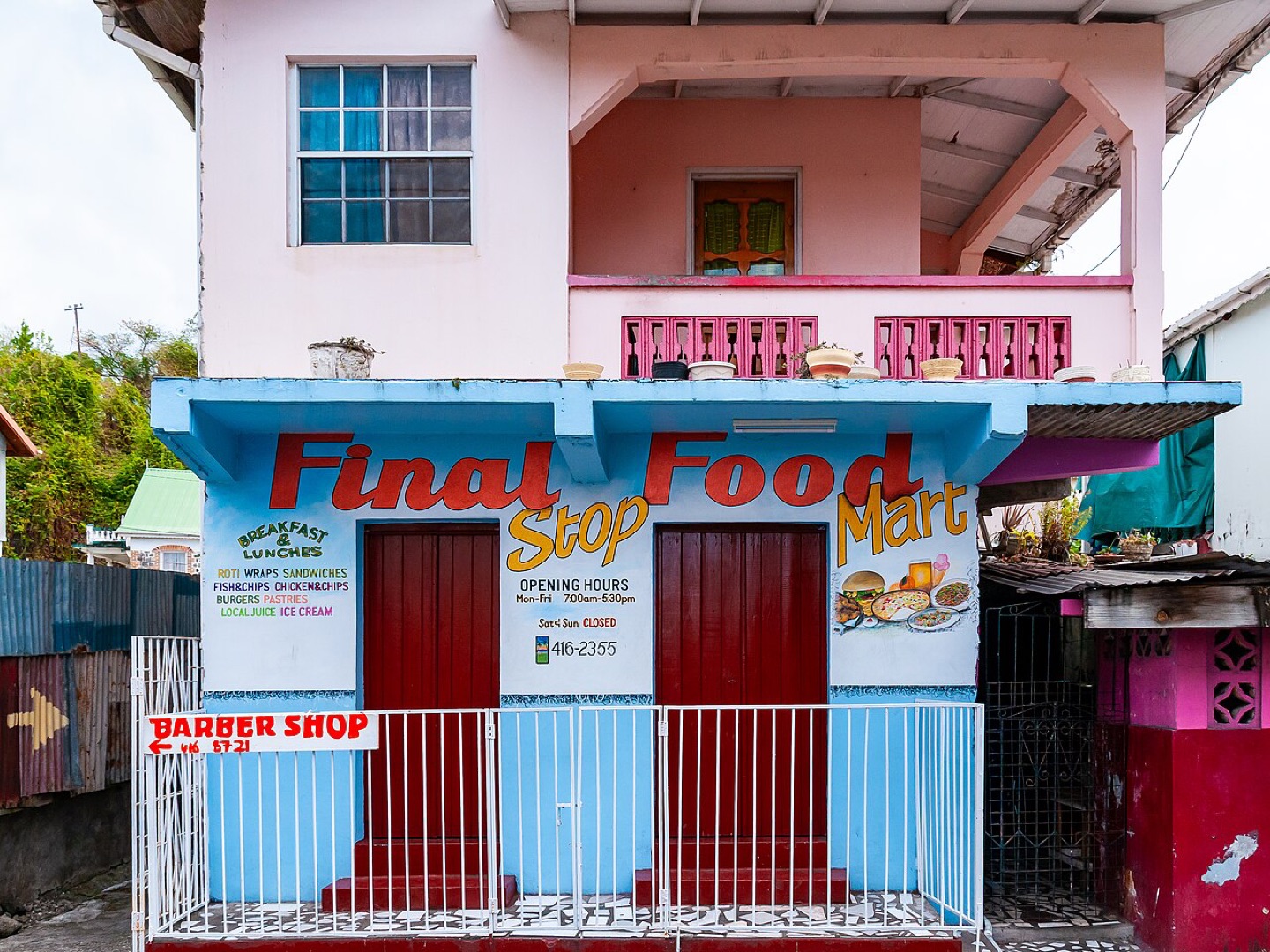 English signs outside shops in Gouyave, Grenada