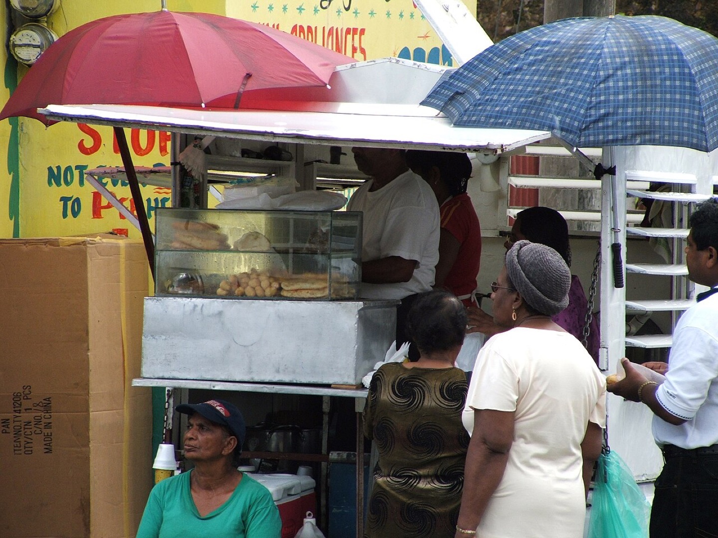 A doubles vendor in Trinidad and Tobago