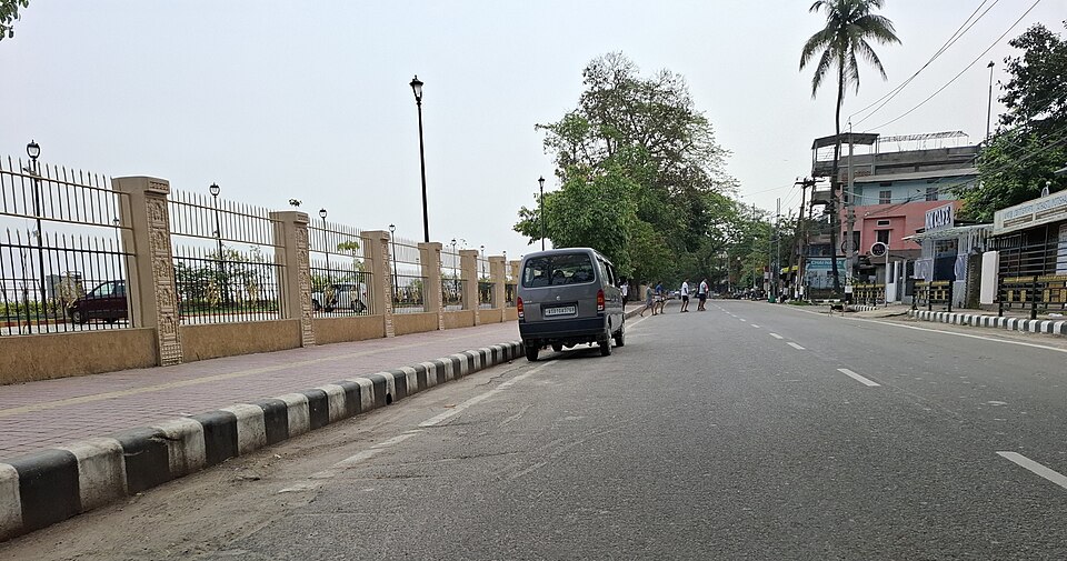 Shops and traffic on a Guwahati street