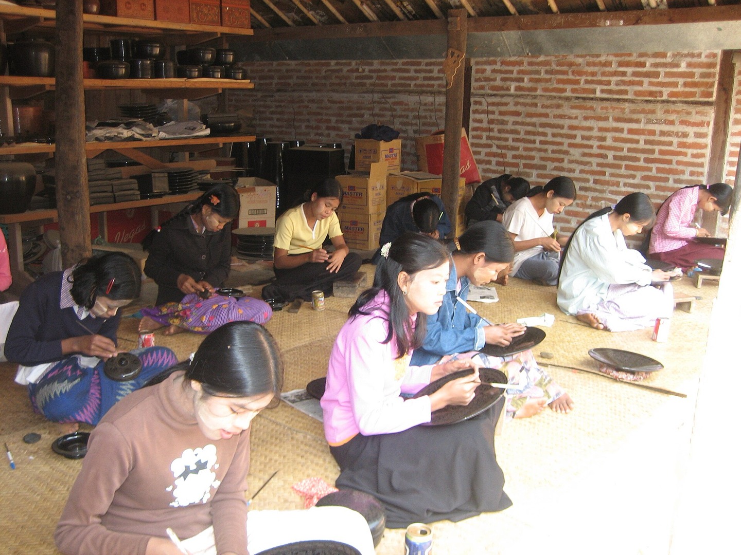 Workers making lacquerware in Bagan, Myanmar