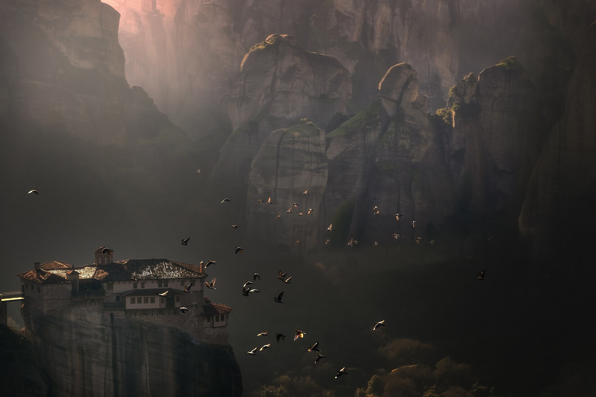 A monastery standing on a rock formation at Meteora, Greece