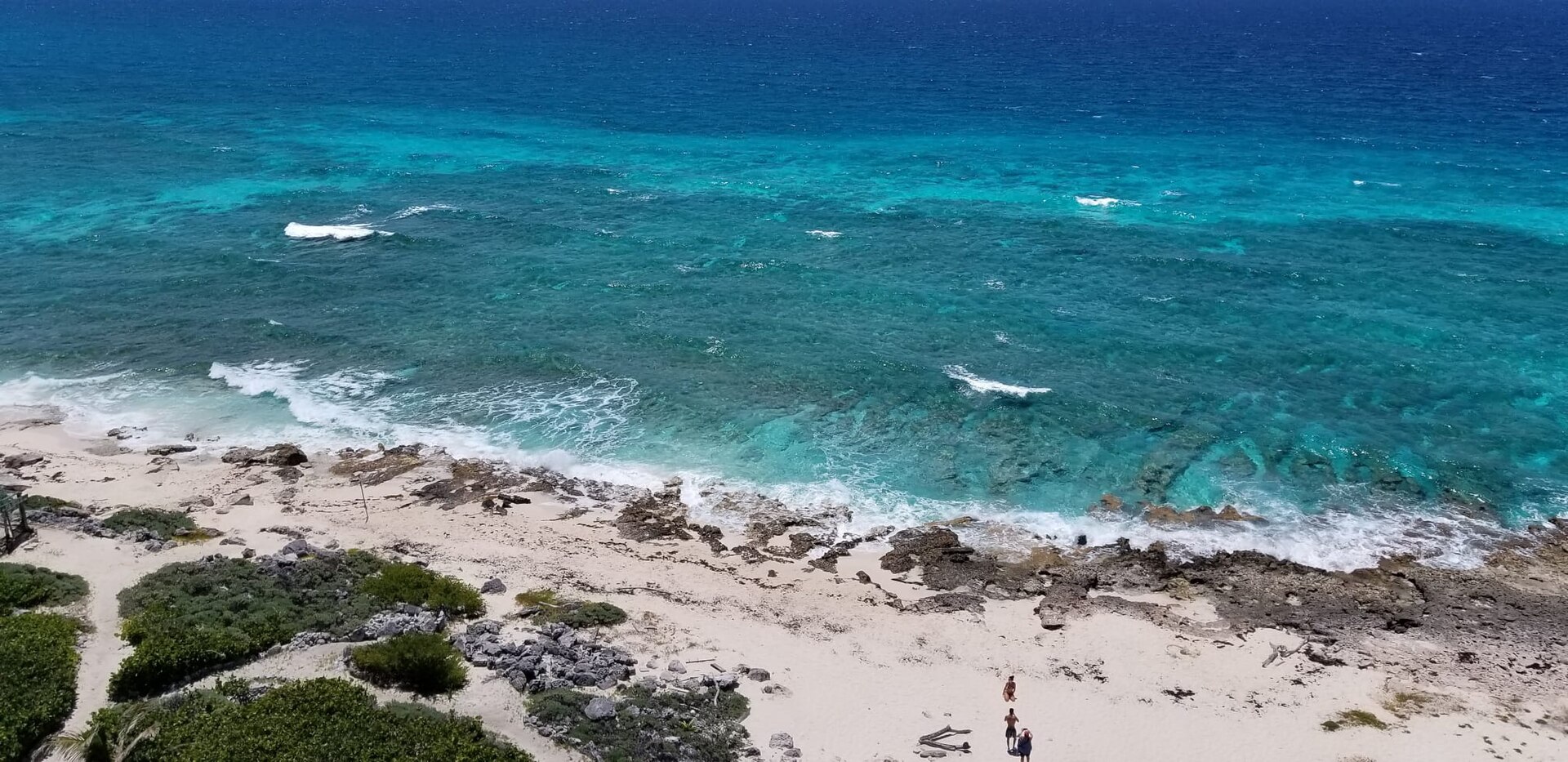 The beach and green hills of Labadee on the coast of Haiti