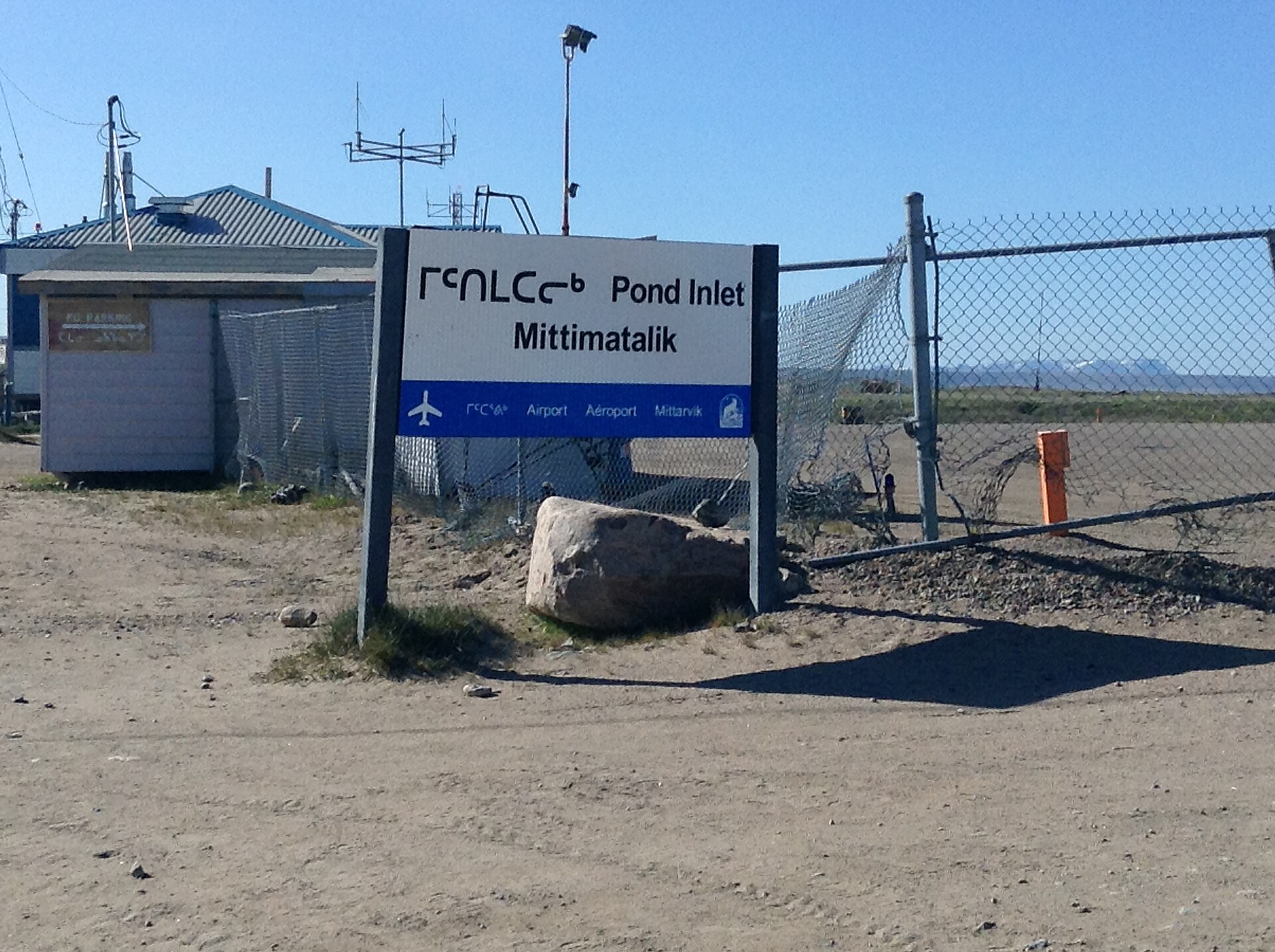 A welcome sign in Inuktitut and English at Pond Inlet, Nunavut