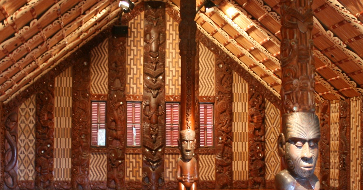 Carved wooden panels inside Te Whare Rūnanga at Waitangi in New Zealand