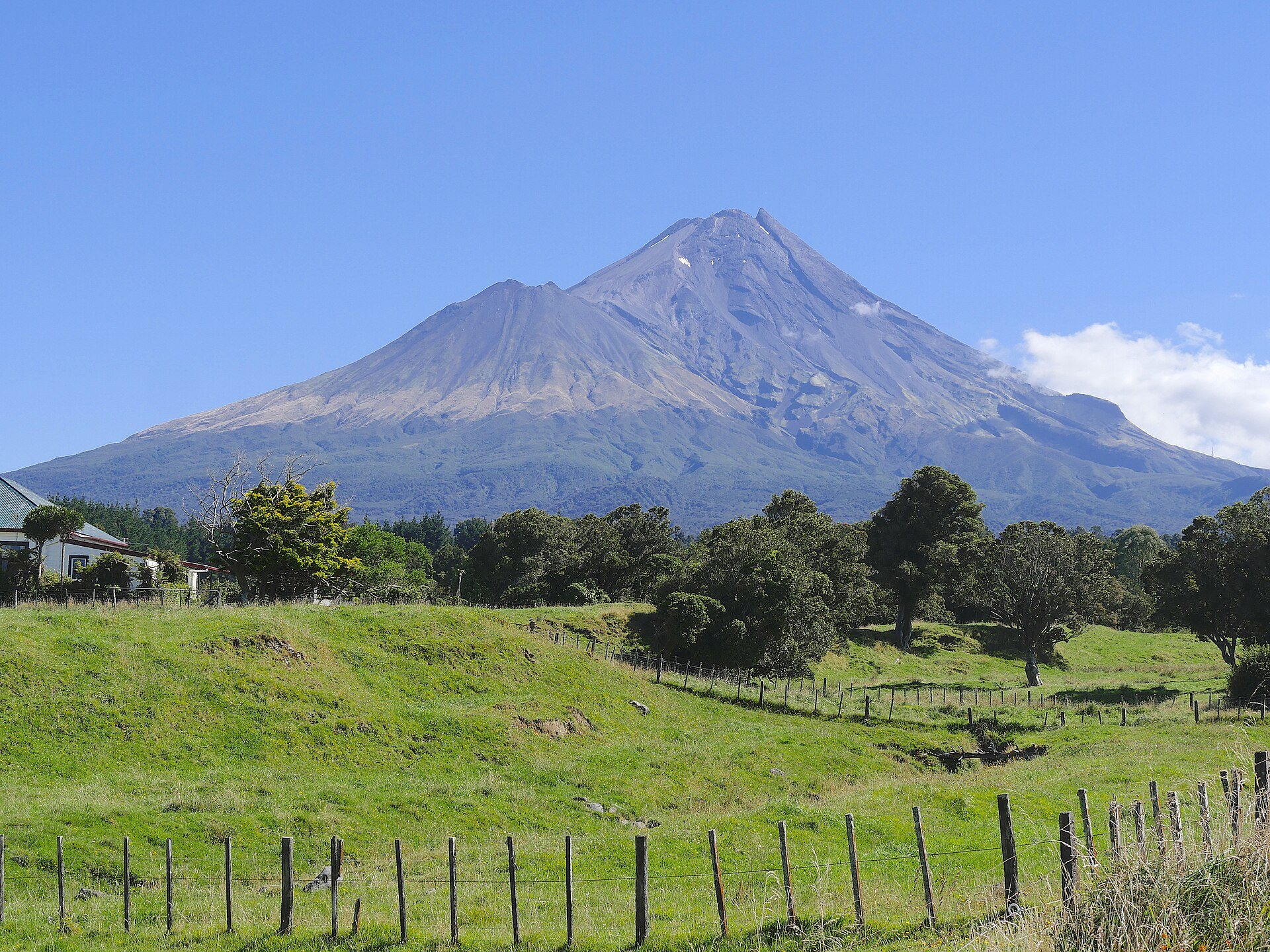 Mount Taranaki and Panitahi rising above the landscape in New Zealand