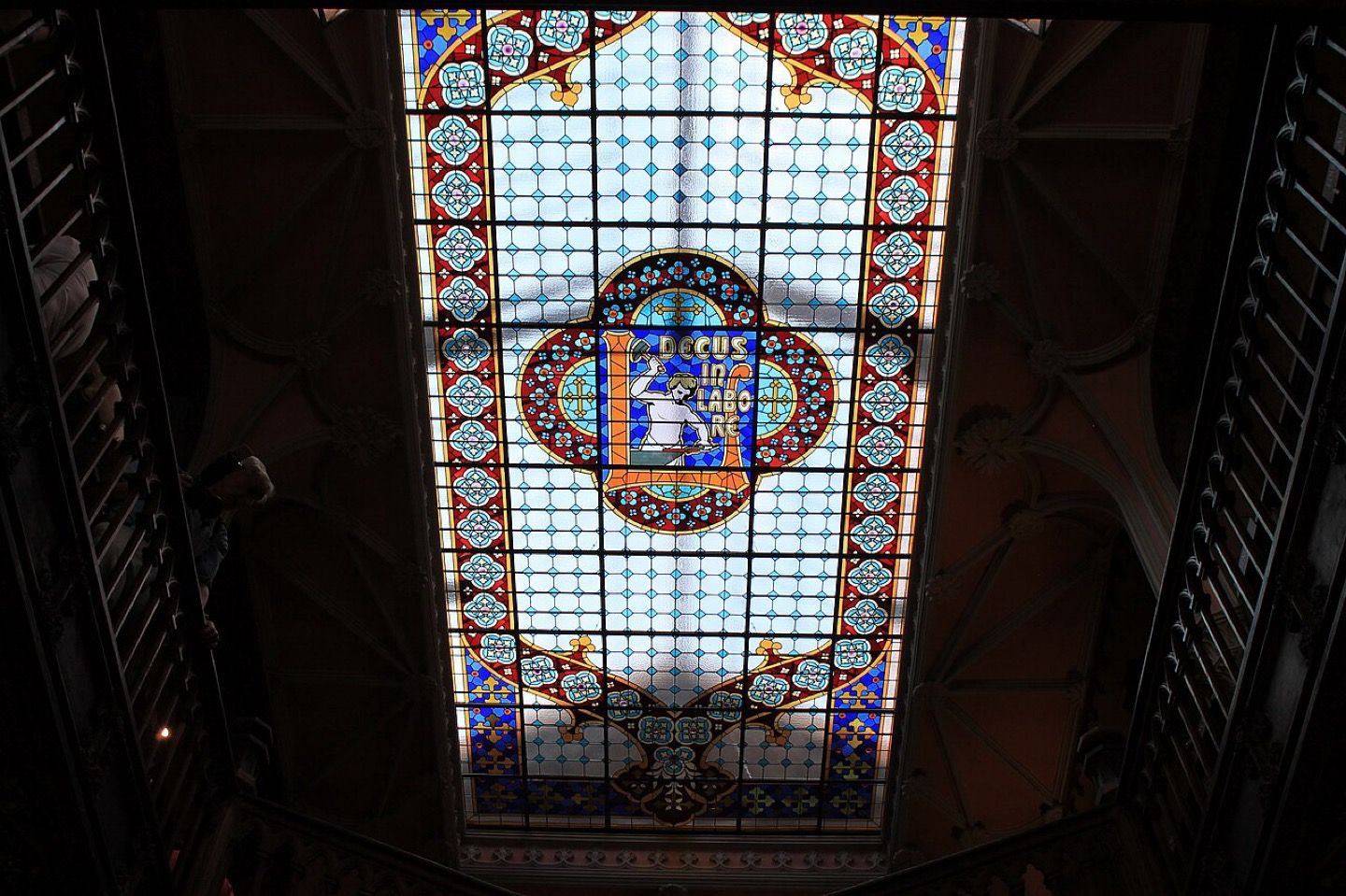 The carved wooden staircase inside the Livraria Lello bookshop in Porto