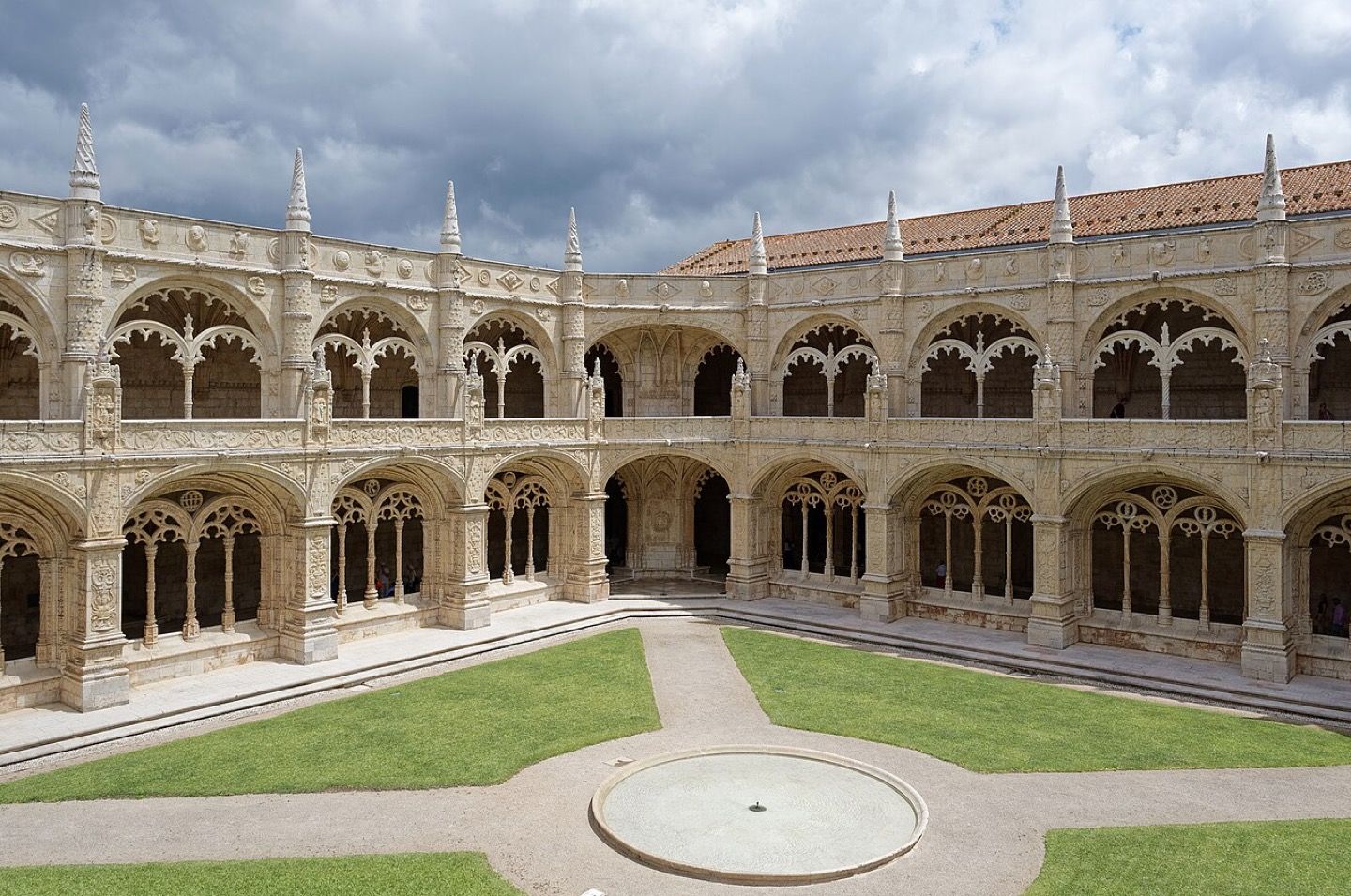 The carved Manueline arcades of the cloister at the Jerónimos Monastery in Belém