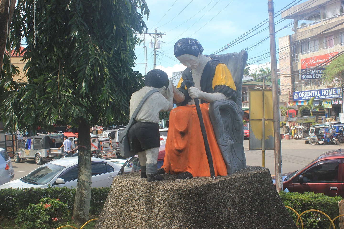 A sculpture depicting the Filipino pagmamano gesture of respect