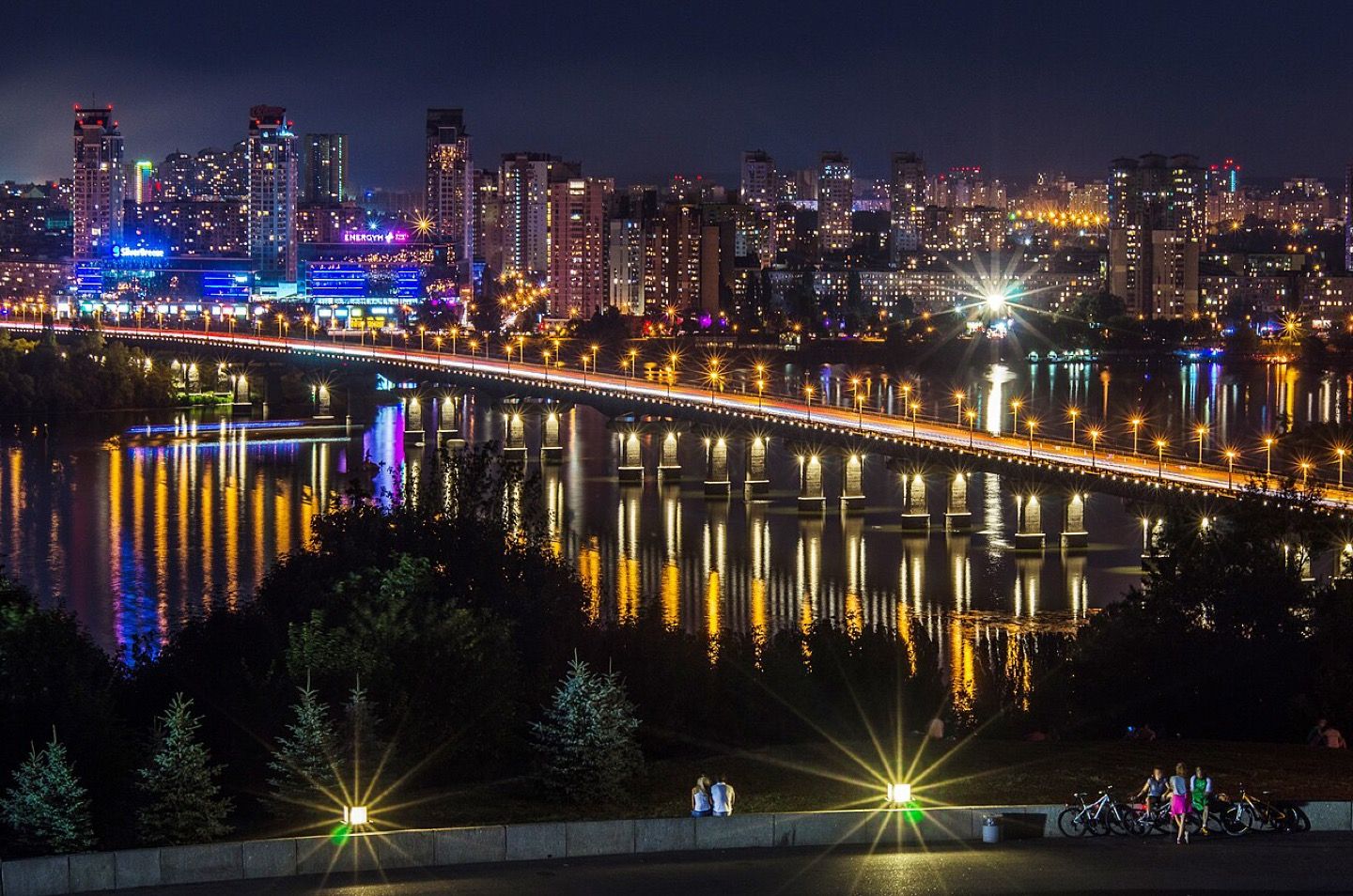 The illuminated Paton Bridge in Kyiv