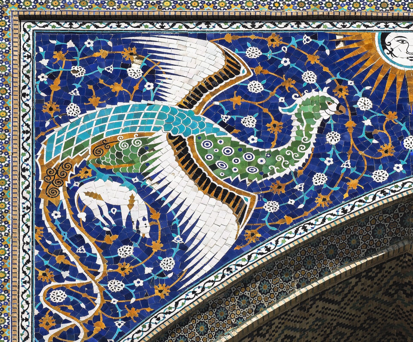 The tiled facade of the Nadir Divan-Begi madrasa in Bukhara, Uzbekistan