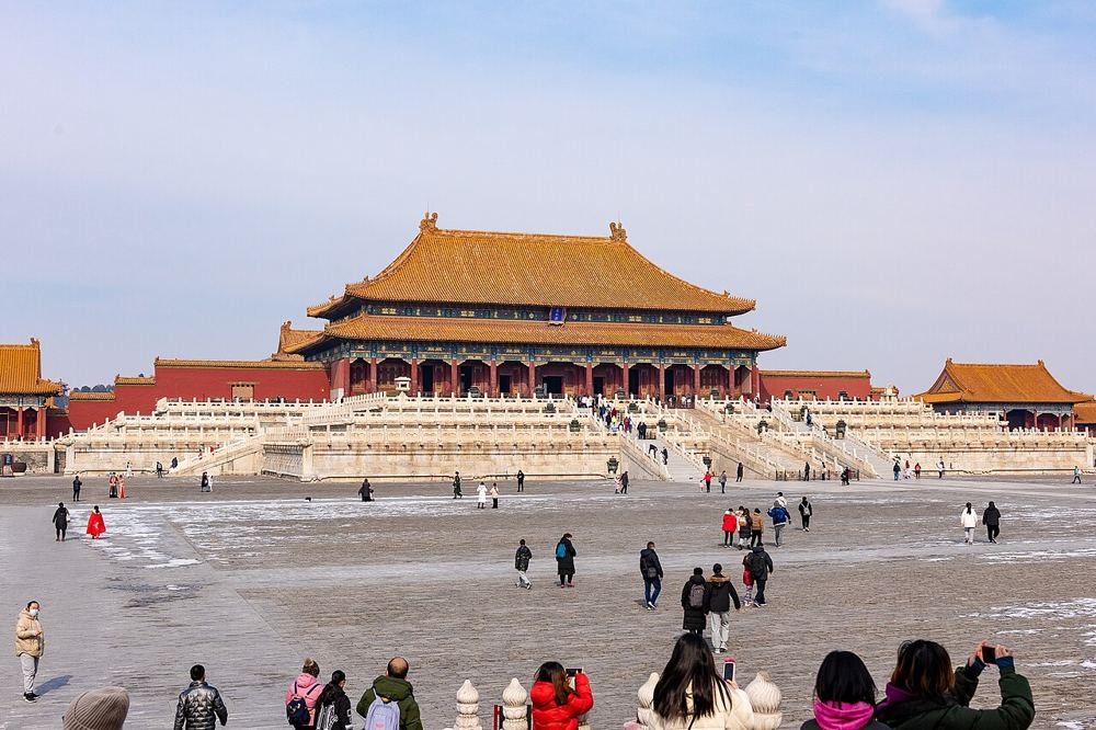 The Hall of Supreme Harmony, with its golden roof, across a wide stone courtyard