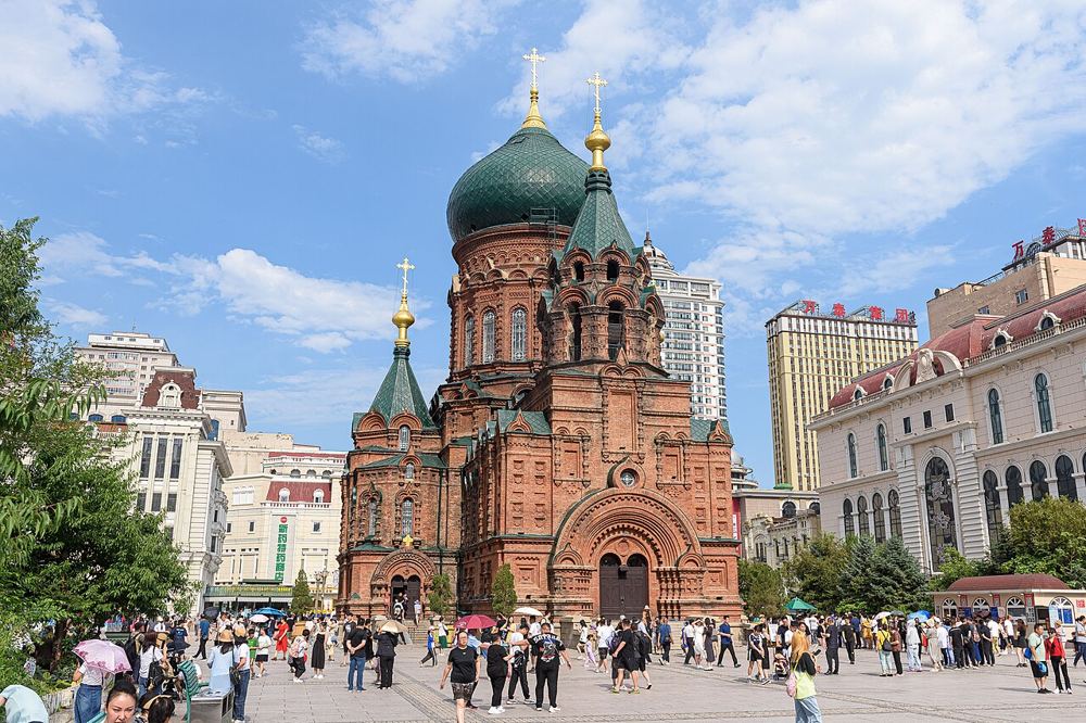 Saint Sophia Cathedral in Harbin, red brick under a green onion dome
