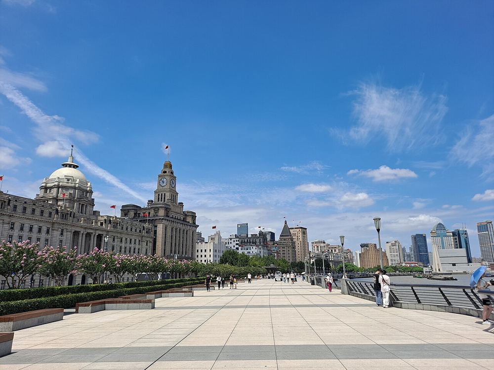 The stone trading houses of the Bund along the riverside promenade