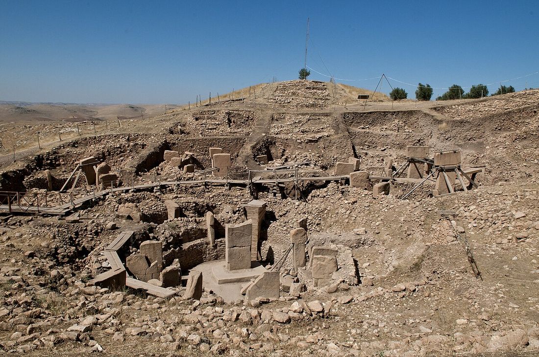 Rings of carved T-shaped limestone pillars dug out of the hillside at Göbekli Tepe